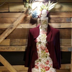 Womens 3/4 sleeve. Ruffle open front.